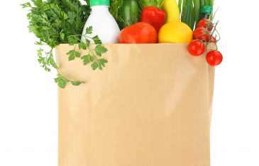 Fresh healthy groceries in a paper bag